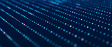 Abstract pattern of blue dots on a dark background